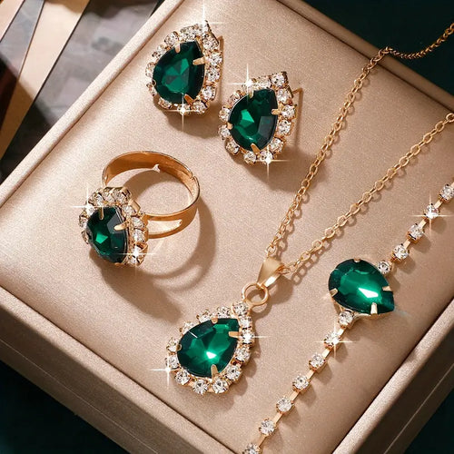 Conjunto de joias Elisandre Vermont em ouro da marca Rose & Oliver, incluindo colar e brincos elegantes e sofisticados.