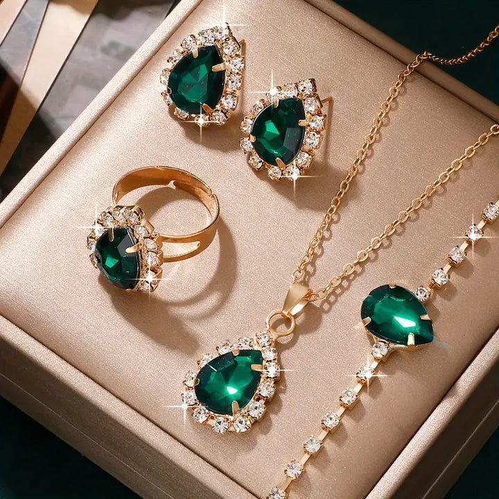 Conjunto de joias Elisandre Vermont em ouro da marca Rose & Oliver, incluindo colar e brincos elegantes e sofisticados.