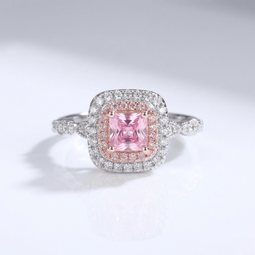 Anel de Rosa e Oliver com zirconia rosa e halo, acabamento brilhante e design delicado para joia elegante.
