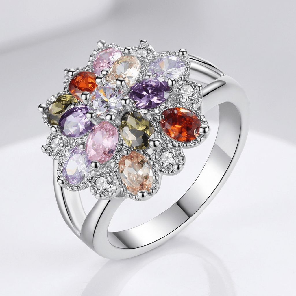 Anel de prata Rainbow Gemstone Burst da Rose & Oliver com pedras coloridas brilhantes e design elegante.