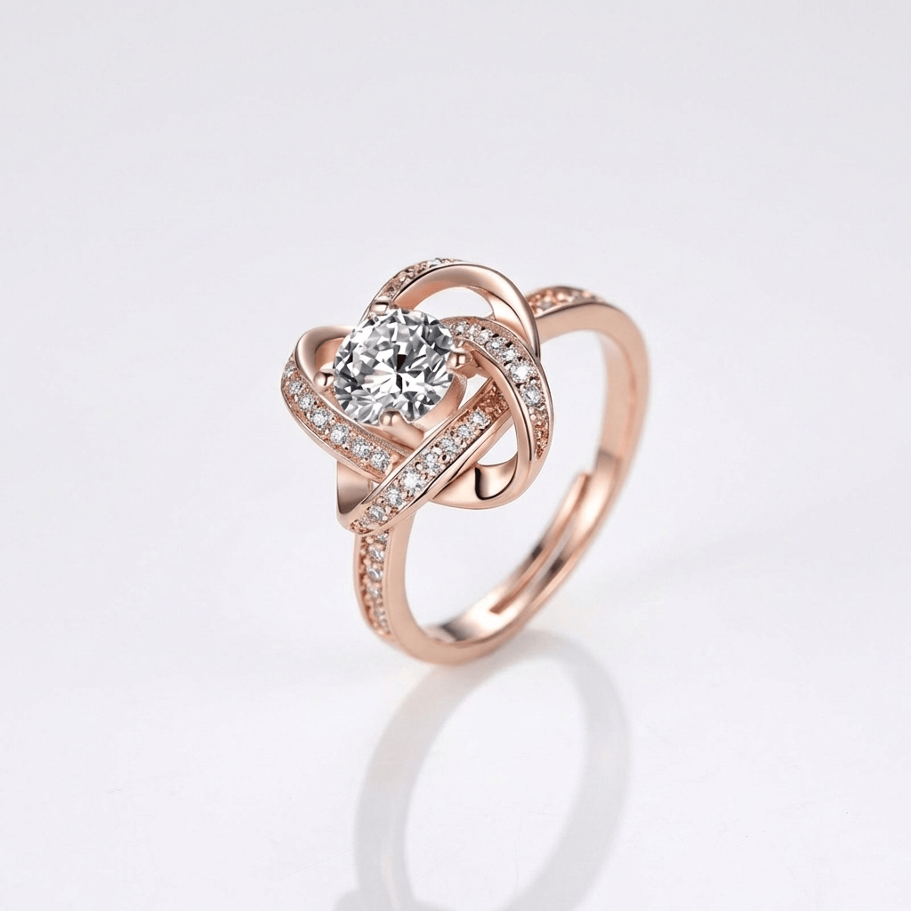 Anel ajustável Rose Gold com nó torcido e zircônias, marca Rose & Oliver, detalhe elegante e delicado.