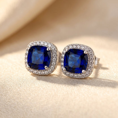Silver Sapphire Halo Stud Earrings by Rose & Oliver - product image 1