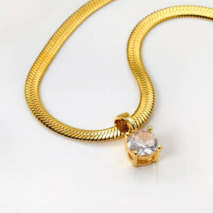 Colar elegante com pingente de strass dourado da Rose & Oliver, feito de ouro, com detalhes brilhantes e acabamento refinado.