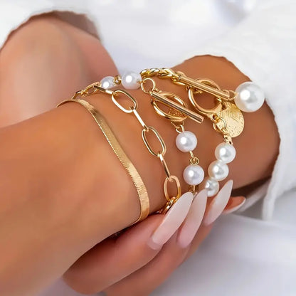 Chic Gold 4-Piece Bracelet Set – Snake, Pearls & Links | Gold by Rose & Oliver, detail view