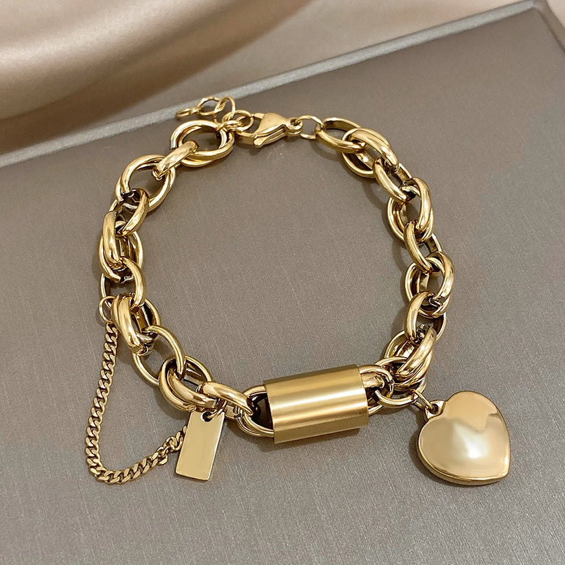 Bracelete chunky dourado da Rose & Oliver, estilo robusto com acabamento elegante, ideal para acessórios de moda.
