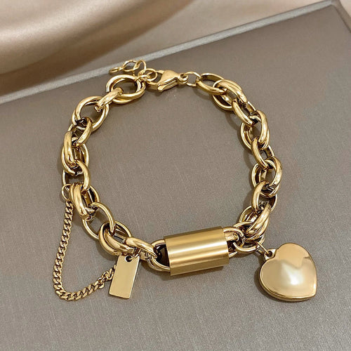 Bracelete chunky dourado da Rose & Oliver, estilo robusto com acabamento elegante, ideal para acessórios de moda.