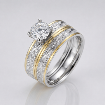 Anel de prata e ouro com faixa listrada e detalhes de diamantes, da marca Rose & Oliver.