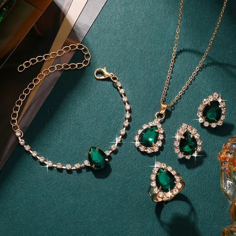 Conjunto de joias Elisandre Vermont da Rose & Oliver com detalhes em ouro, incluindo colar e brincos elegantes.
