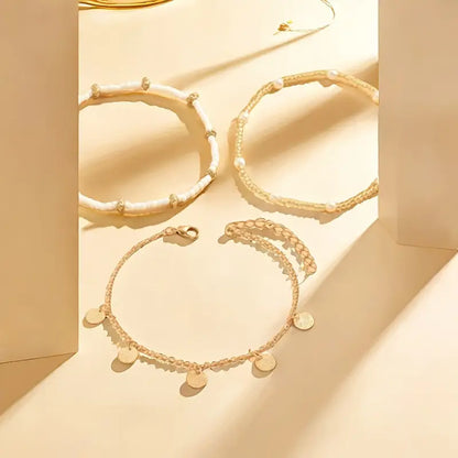 Coastal Charm 3-Piece Layered Anklet Set | Gold by Rose & Oliver, detail view