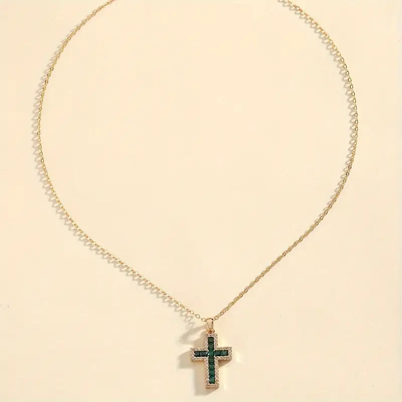Solene Emerald Cross Pendant Necklace | Gold by Rose & Oliver, detail view